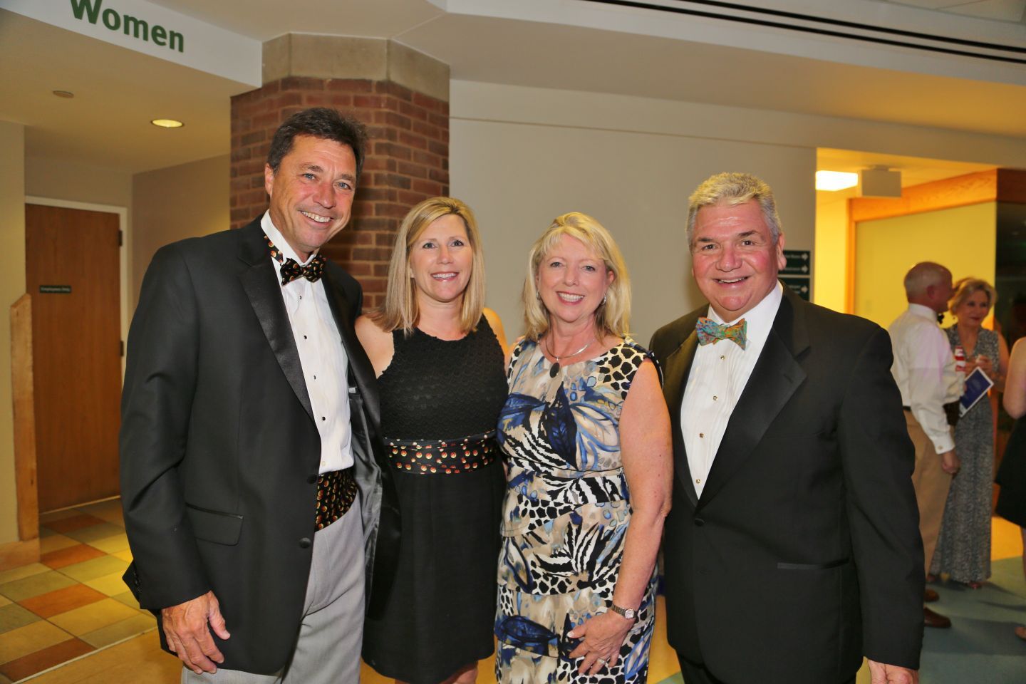 Dan and Kelly Harbaugh, Sandy and John Irace